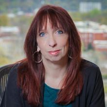 Paula Tkac Headshot