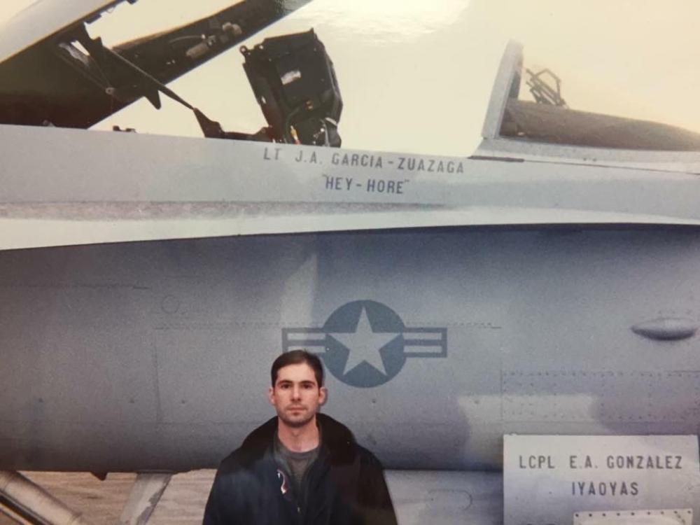 soldier (garcia-zuazaga) standing in front of a military aircraft